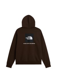 Sweat à capuche marron foncé avec le logo The North Face et le texte "Never Stop Exploring" au centre du dos.