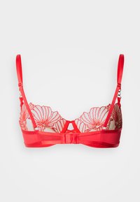 Soutien-gorge en dentelle rouge avec broderie florale, bonnets en maille transparente, bretelles réglables et fermeture à agrafes. Bande lisse rouge en bas.