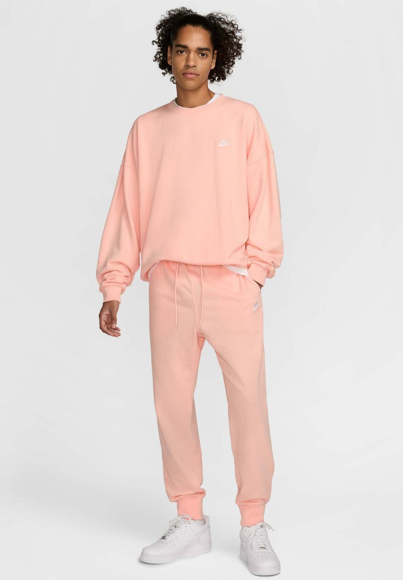 Nike Sportswear Trainingsbroek koraalrood Nike Sportswear Trainingsbroek koraalrood