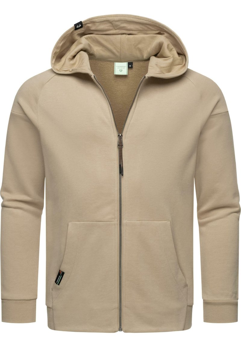 Felpa con zip beige realizzata in morbido tessuto texturizzato. Presenta un grande cappuccio, due tasche frontali e polsini a coste. Design semplice e minimale.
