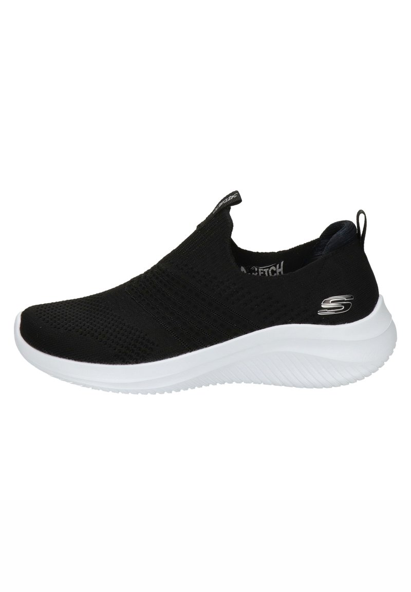 Svart atletisk slip-on sko med en teksturert strikkoverdel, polstret hvit mellomsåle og liten logo på hælen.