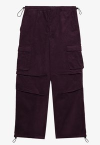 Kavajbyxor i mörklila cordflätad material. Har resårmidja, flera sidofickor och justerbara ankelband. Texturerat tyg.