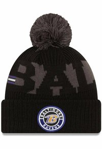 Black knit beanie featuring a gray patterned design, topped with a pom-pom. Embroidered Baltimore Ravens logo on the front.