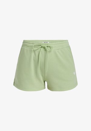 Green cotton shorts with an elastic waistband, drawstring, and side pockets. Features a small white logo on the left leg.