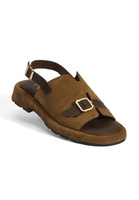 Brauner Wildledersandalette mit einer geschnallten Riemen, offener Zehenpartie und einer strukturierten Gummisohle. Mit einem kontrastierenden dunklen Lederakzent.