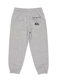 Grijze katoenen sweatpants met elastische tailleband en boorden. Beschikt over een achterzak met een zwart logo. Zachte textuur en relaxte pasvorm.