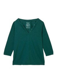 Teal green long-sleeve top with a V-neck, three-button placket, and a relaxed fit. Made from organic cotton with a soft texture.