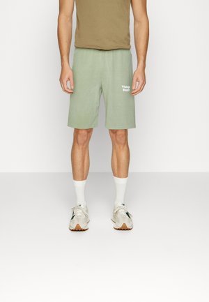 CORE LOGO SHORTS UNISEX - Shorts - overdye green