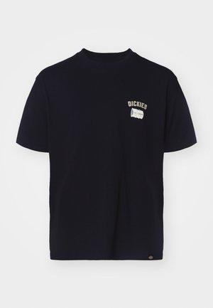 Navy blue cotton t-shirt with short sleeves, featuring a chest graphic label and embroidery reading "DICKIES 100% GENUINE."