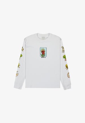 Valkoinen pitkähihainen t-paita, jossa on värikkäitä kuvastoja, mukaan lukien liekkien ympäröimä ruusu ja erilaisia grafiikoita hihoissa. Pehmeä puuvillamateriaali.