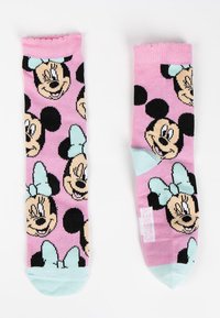 Calzini rosa con stampa totale del viso di Topolino in nero e beige, con dettagli verde menta sulla punta e un polsino ondulato.