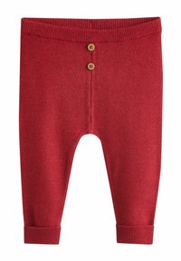 Red knitted pants featuring a ribbed waistband, two decorative buttons, and rolled cuffs. Material has a textured finish.