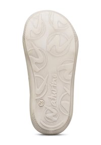 Suela de un zapato de color beige claro con patrones circulares texturizados, el nombre de la marca "Naturino" y el número de talla 20 grabado.