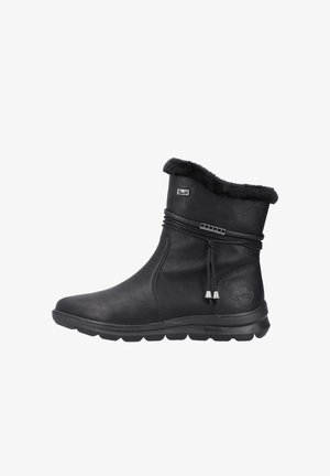 Botas negras de cuero hasta el tobillo con cuello de pelo sintético, cordón decorativo y acentos plateados. Cuentan con una suela de goma flexible para mayor comodidad.