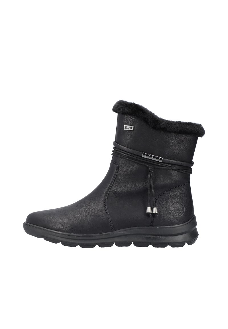 Bottines en cuir noir avec col en fausse fourrure, cordon décoratif et accents en argent. Elles disposent d'une semelle en caoutchouc flexible pour le confort.