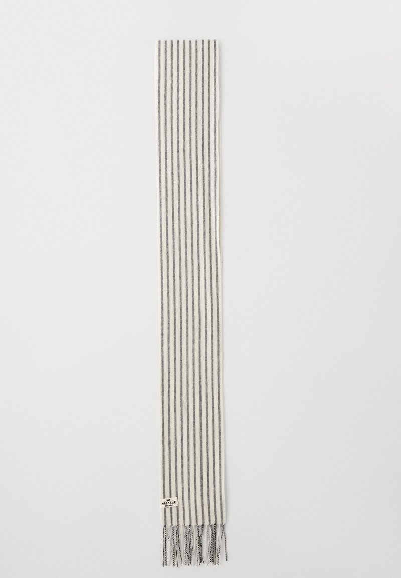Sciarpa a righe in crema e nero, con righe verticali, bordi frangiati e un piccolo etichetta del marchio vicino al fondo. Tessuto morbido.