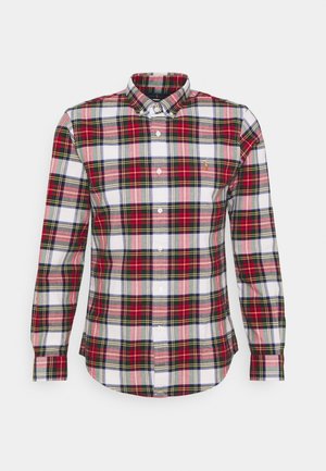 Camisa de manga larga de cuadros con patrones en rojo, verde, azul marino y blanco. Cuello abotonado y diseño ajustado. Material de algodón.