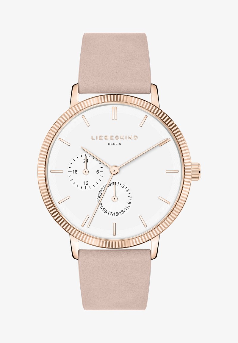 Ronde horloge met een witte wijzerplaat, roségouden accenten en een beige leren band. Bevat twee subdials en dunne uurmarkeringen.