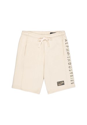 Beige šortky s elastickým pasem a šňůrkou, boční kapsy a vertikálně tištěné maskovací logo na levé straně.
