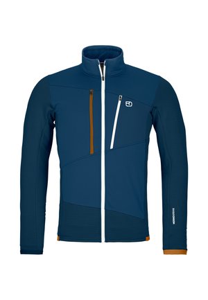 Men's zip-up jacket in dark blue with light blue and orange accents. Features a high collar, diagonal seam design, and two zippered pockets.