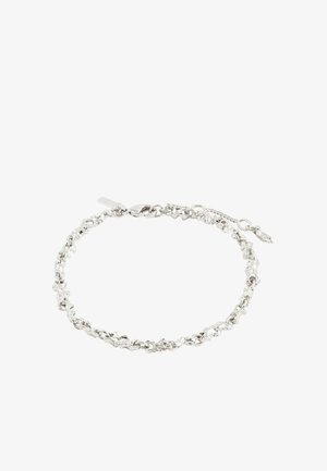 Hõbedase tooniga kettkäevõru ebaühtlaste, tekstuuriga linkidega ja langusekinnitusega, millel on reguleeritav ketipikendus.