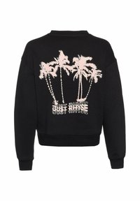 Svart genser med rund hals, prydet med et rosa palmetre-motiv og teksten "JUST RHYSE" bakpå, laget av mykt stoff.