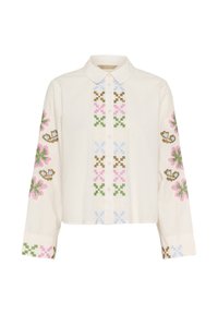 Hemdbluse aus cremefarbenem Baumwollstoff mit floralem Stickerei in Rosa, Grün, Blau und Braun an den Ärmeln und vorne, ausgestattet mit einem klassischen Kragen.