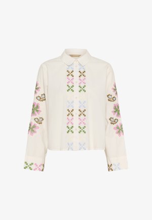 Kreemivärvi puuvillane särk, millel on roosade, roheline, sinise ja pruuni lillekattelise tikandiga varrukad ja esiküljed, klassikalise kraega.