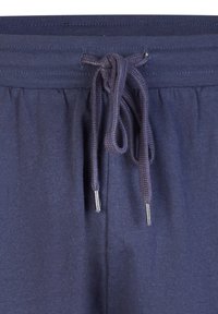 Navy blue puuvillaiset jogginghousut, joissa on joustava vyötärökiristys ja metalliset nyörit, suunniteltu pehmeästä ja kevyestä kankaasta.