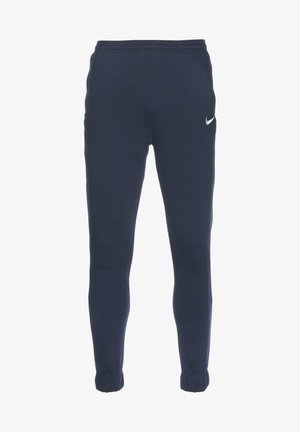 Navy blue sweatpants made of soft fabric, featuring a tapered design, elastic waistband, and a small white Nike logo on the left thigh.