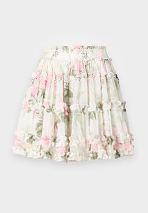 Jupe évasée en tissu léger avec un ourlet froncé, ornée d'un mélange de motifs roses et verts sur un fond clair.