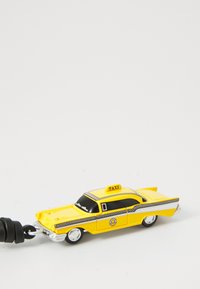 Yellow toy taxi car with black and white checkered accents, detailed front grille, and a "TAXI" sign on the roof. Smooth plastic surface.