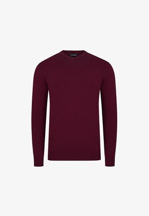 Burgundowa, długiego rękawa sweter o prążkowanej strukturze z dekoltem w kształcie litery V. Prosty i klasyczny, bez ozdób czy wzorów.