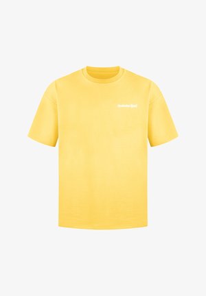 Gelbes Baumwoll-T-Shirt mit kurzen Ärmeln und Rundhalsausschnitt. Mit dem weißen Text "Smilodax Sport" auf der linken Brustseite.