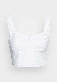 White cropped tank top with wide shoulder straps and structured bust detailing against a plain background.