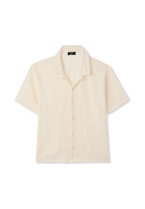 Camicia a maniche corte con bottoni, in tessuto crema chiaro, dalla texture leggermente zigrinata con motivo a zigzag discreto e colletto classico.
