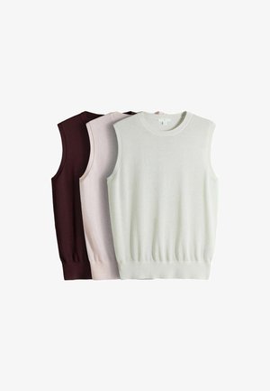 Három ujjatlan kötött pulóver fehér, világos rózsaszín és sötétbarna színben, egymásra rakva és egymás mellé rendezve.