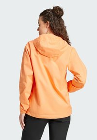 Adidas Terrex MULTI TWO-LAYER RAIN.RDY - Regenjacke / wasserabweisende Jacke - amber tint