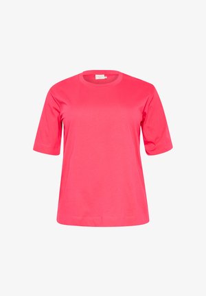 Rövid ujjú rózsaszín póló, puha anyagból készült, kerek nyakkivágással és laza fazonnal, látható minták vagy díszítések nélkül.