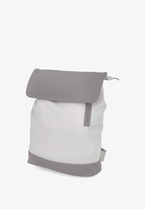 Backpack with light grey body, darker grey flap closure, and bottom trim, featuring a small side loop and minimalist design.