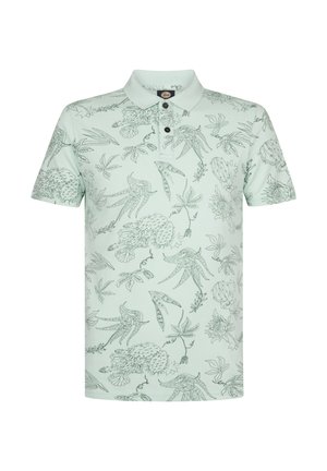 Polo verde menta chiaro con dettagliate illustrazioni botaniche e di uccelli in verde scuro. Colletto classico con bottoni. Maniche corte.