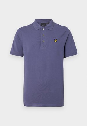 Polo shirt in dark purple cotton with a classic collar, three-button placket, and a yellow embroidered logo on the left chest.