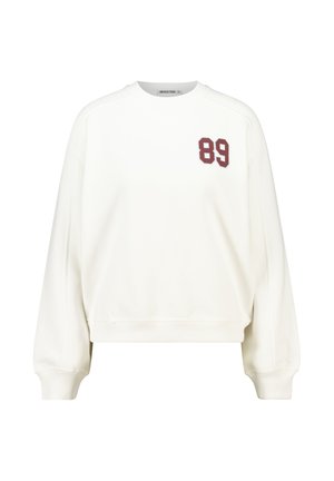Sudadera blanca de corte relajado, con puños acanalados y un "89" burdeos impreso en el lado izquierdo. Textura suave y cuello redondo.