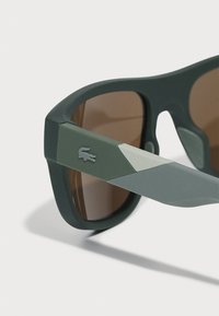 Lacoste Sluneční brýle - matte khaki