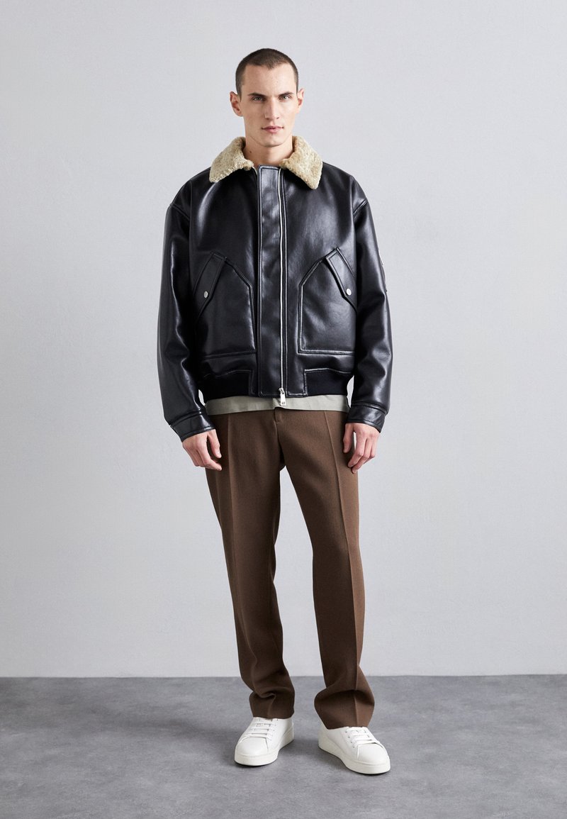 Nanushka LUDE Faux leather jacket cornstalk/black/black Zalando