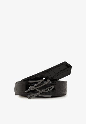 Black, crocodile-textured leather belt featuring a glossy finish and a distinctive metallic buckle with curved accents.