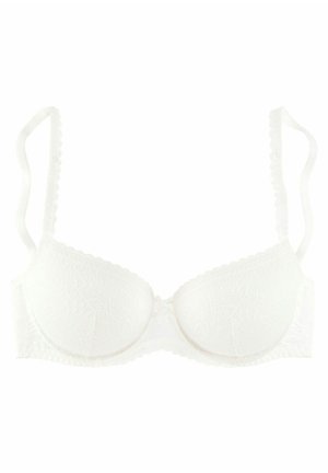 Reggiseno bianco in pizzo con coppe imbottite e spalline scallop regolabili. Presenta un dettaglio centrale a fiocco e un motivo floreale testurizzato sul tessuto.