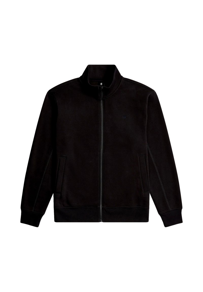 Giacca nera con zip realizzata in materiale morbido. Presenta un colletto alto, due tasche anteriori e polsini a coste. Design minimalista con marchio discreto.