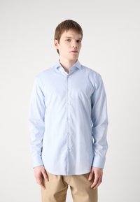 Light blue long-sleeve shirt made of cotton, featuring a button-down collar, front buttons, and a smooth texture.