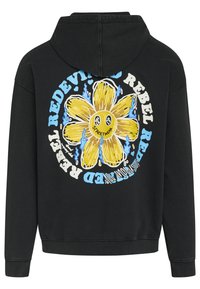 Felpa nera con cappuccio caratterizzata da una grande grafica di un fiore giallo con faccine sorridenti, circondata da testo blu che recita "REDEVI-" e "REBEL". Materiale misto cotone.